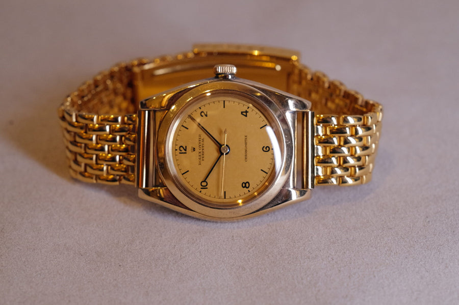 30’s 18K Bubble back